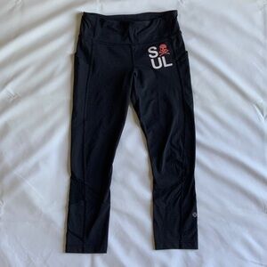 Lululemon Athletica Soul cicle capri Black Leggings with Red Skull Design